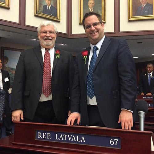 Florida Sen. Jack Latvala was a proud papa on March 3, 2015, as his son, Chris Latvala, '04, took his newly elected seat on the floor of the Florida House of Representatives.