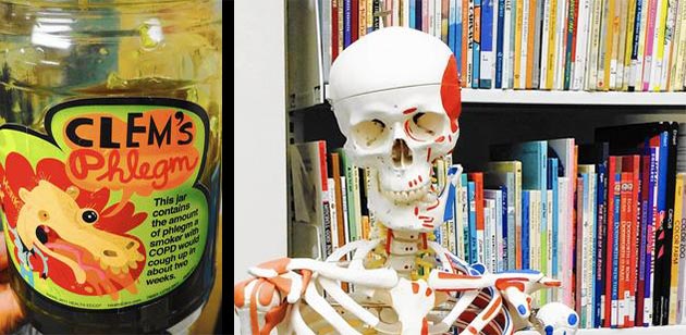 (Left) Yolanda Hood, the head librarian at the UCF Curriculum Materials Center, holds a jar of fake phlegm that teachers sometimes borrow for anti-smoking lessons in their classroom. Or, it can be a way to measure volume, one student suggested. (Right) The Curriculum Materials Center is a tucked-away branch of the UCF main library that is full of books and worksheets for teachers to use as well as more quirky items, such as fake phlegm, skeletons and musical instruments. (Gabrielle Russon, Orlando Sentinel)
