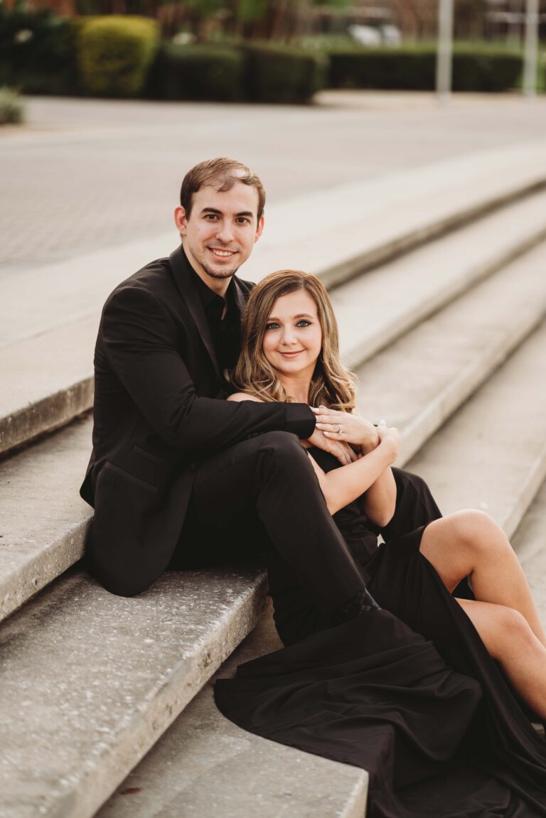 couple posing on steps