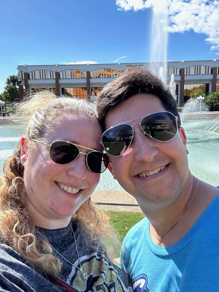 ucf couple in front of fountain