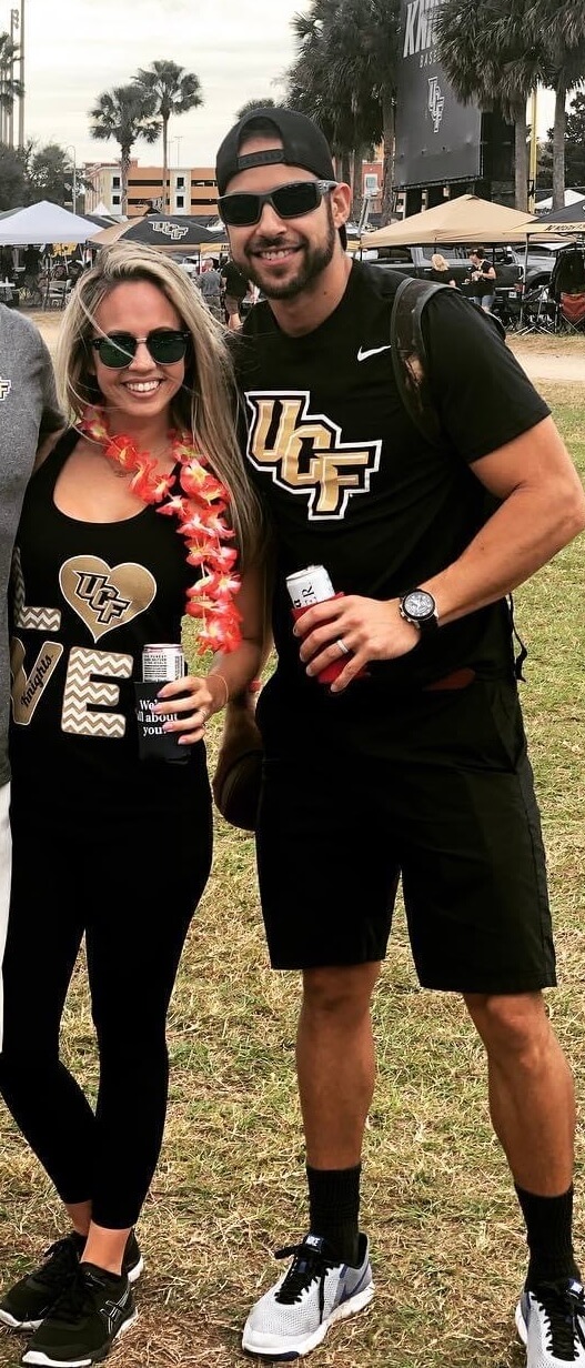 couple in ucf gear