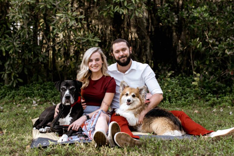 couple and some dogs outside