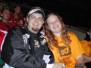 man and woman at UCF game