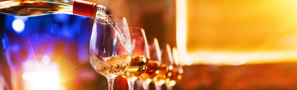 Sword and Cellar - image of wine being poured in a glass