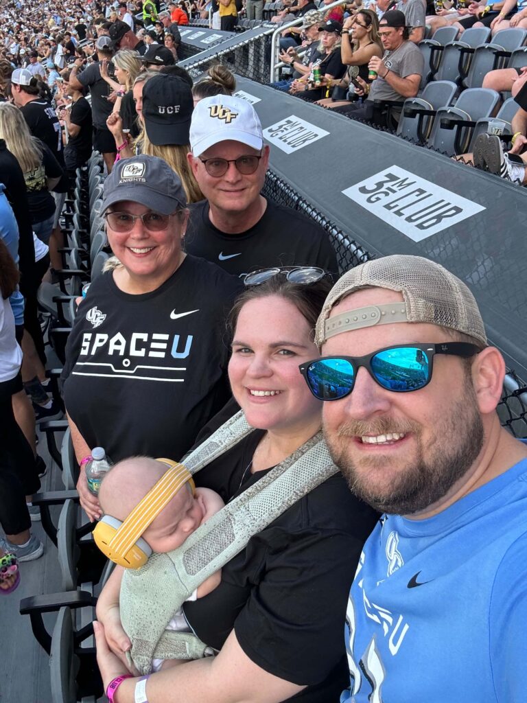 a family at a UCF football game