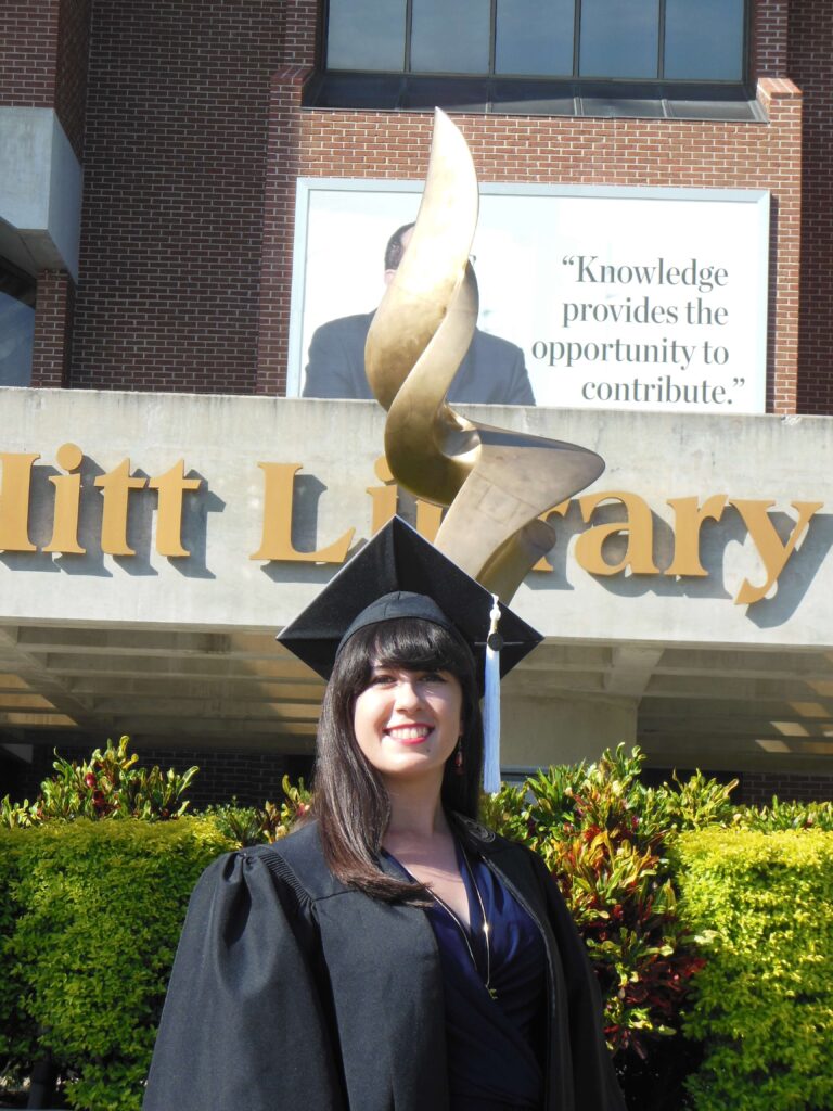 woman in ucf regalia