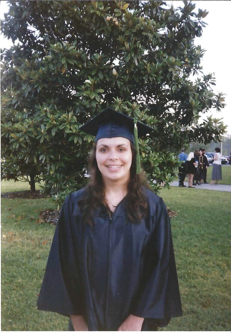 woman in graduation regalia
