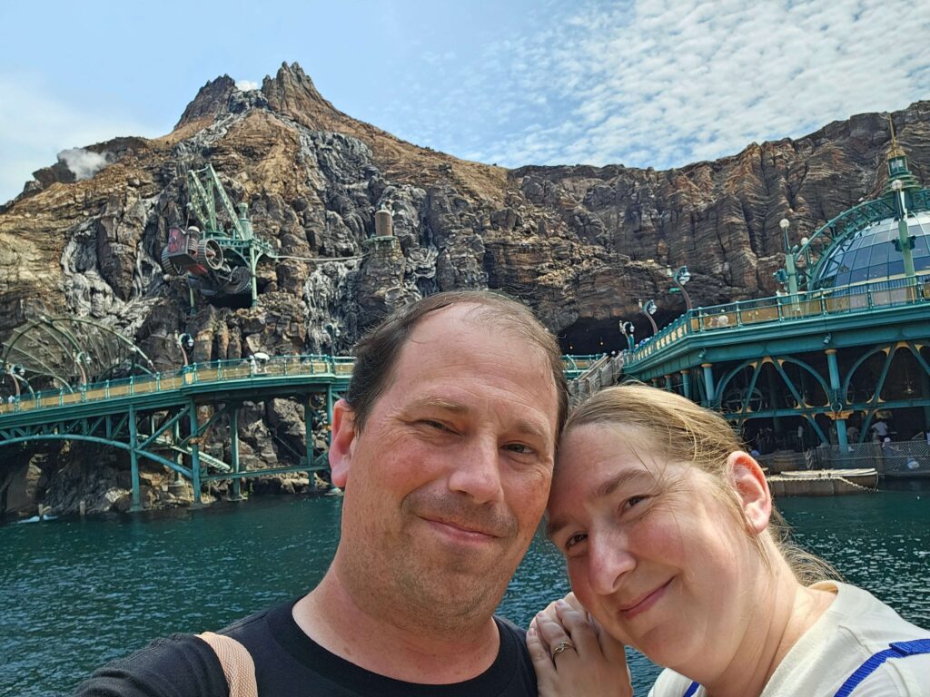 man and woman at theme park