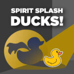Image of a Spirit Splash Duck in a spotlight with a silhouette wearing a cape