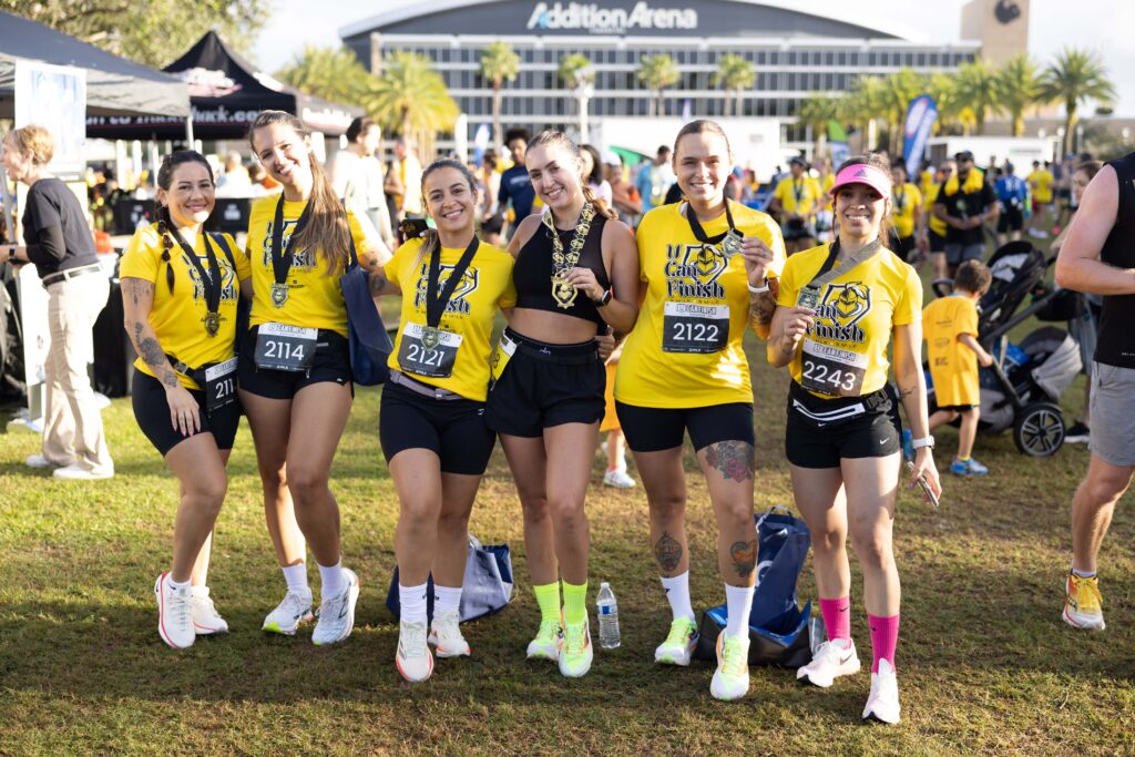 grop of students posing after a race
