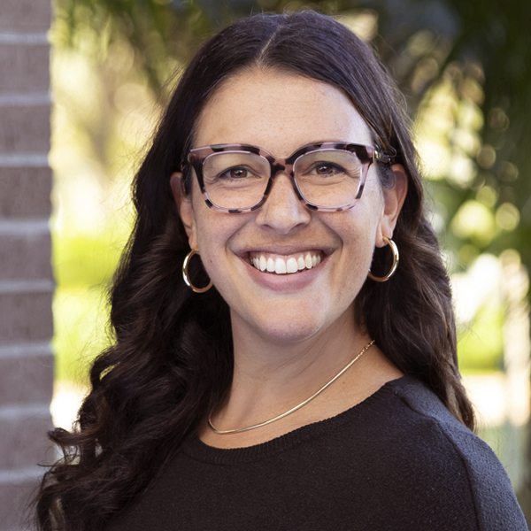 headshot image of Emily