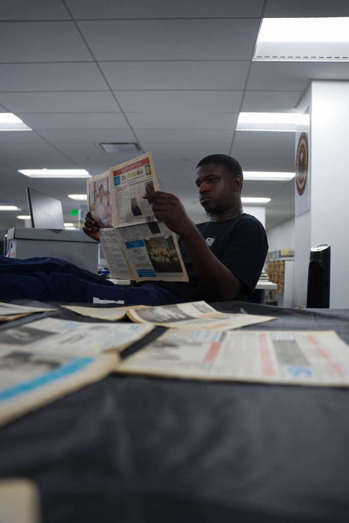 man reading a newspaper