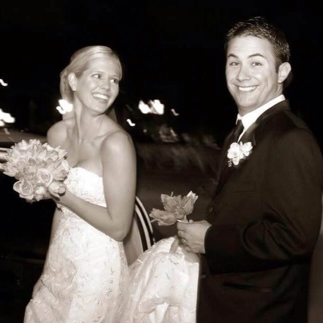 man and woman in wedding attire