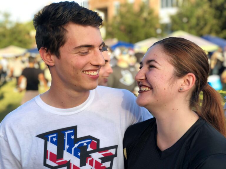 man and woman looking at each other