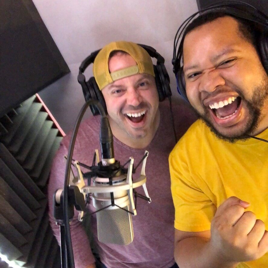 two men in recording booth