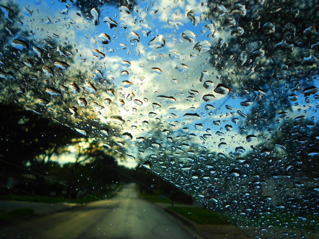 Windshield 2018 - UCF Alumni art photo of raindrops on a windshield