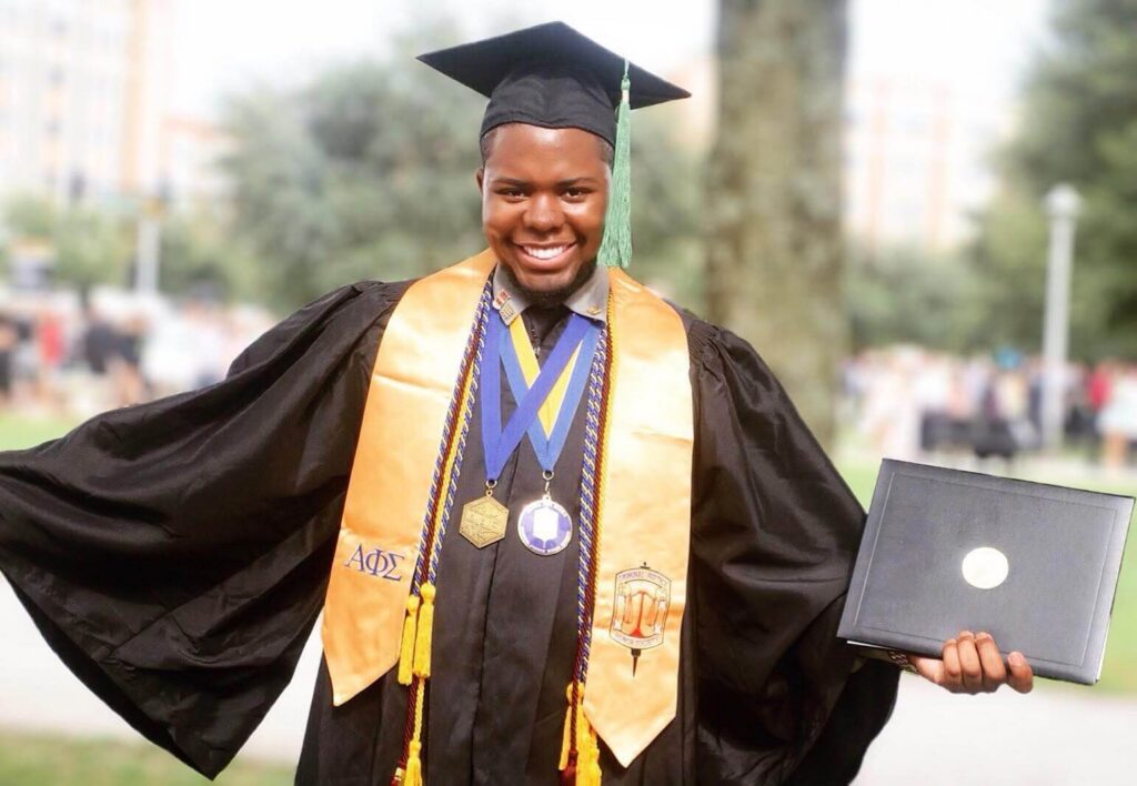 man in ucf regalia