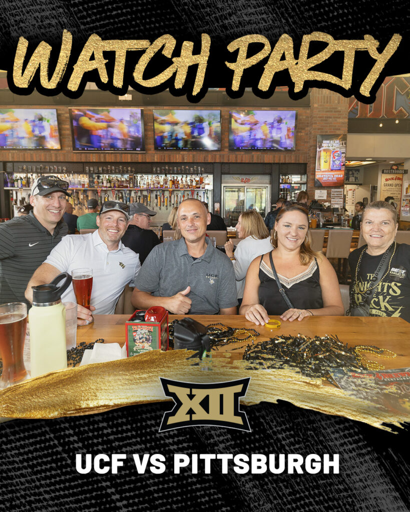 Group of five people smiling at a bar table during a sports watch party for UCF vs. Pittsburgh, with drinks and beads on the table and multiple TVs behind.