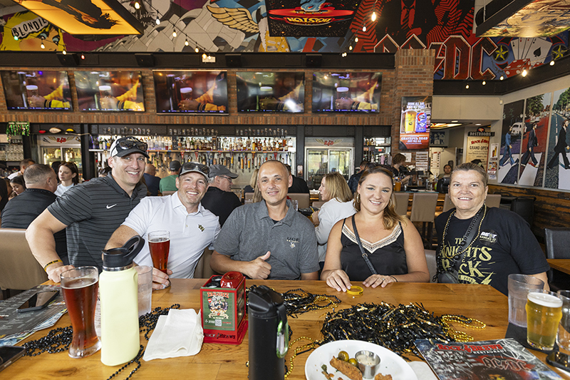 Knights fans at a restaurant enjoying a watch party