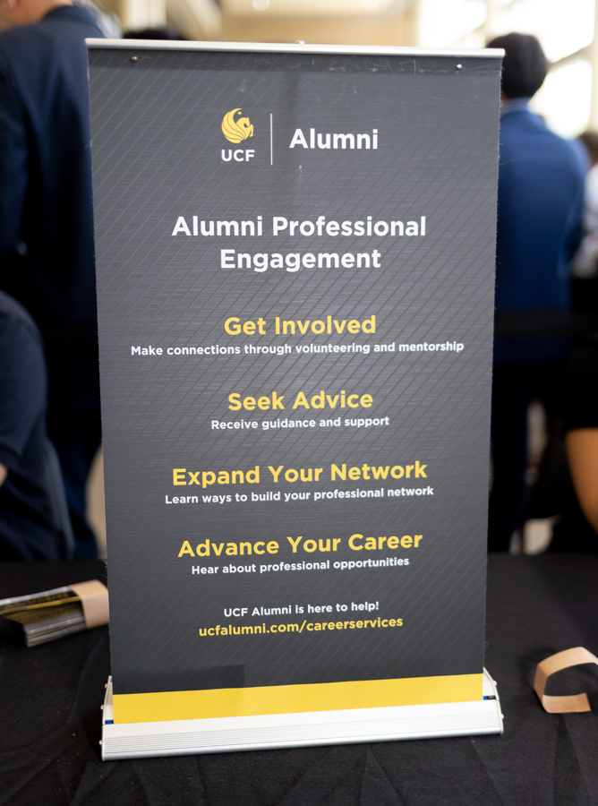 Vertical banner: UCF Alumni—Alumni Professional Engagement with Get Involved, Seek Advice, Expand Your Network, Advance Your Career on a dark patterned backdrop.