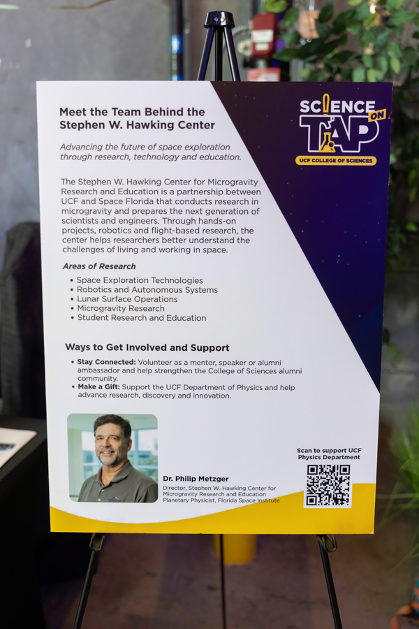 Informational poster about the Stephen W. Hawking Center team; includes research areas, a photo of Dr. Philip Metzger, and a QR code.