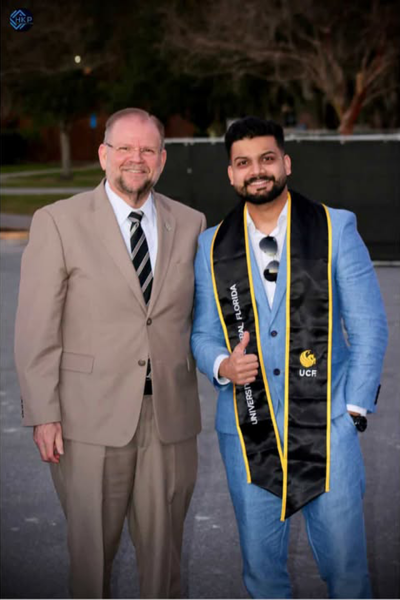 ucf graduate with president of UCF